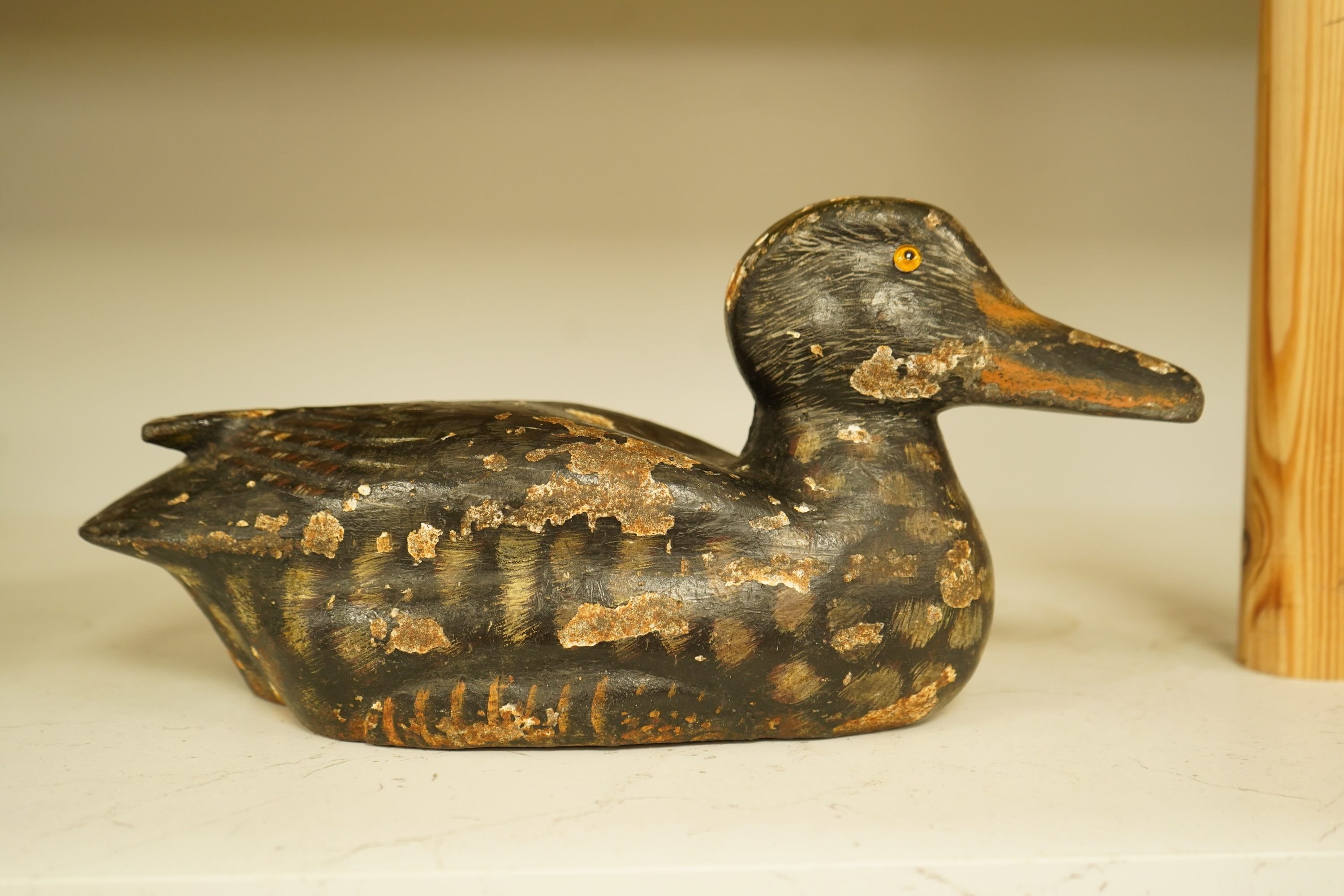 A novelty cast iron doorstop in the form of a duck, 32cm wide